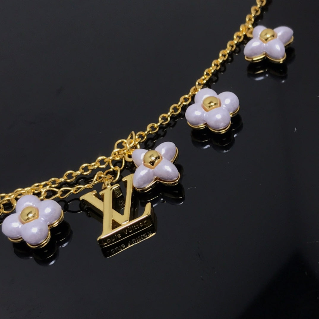 [Avelora]LOGO 6 MOTIF STAR AND SUN GOLD BRACELET