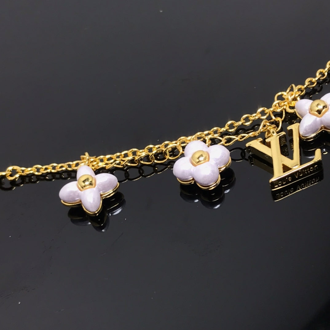 [Avelora]LOGO 6 MOTIF STAR AND SUN GOLD BRACELET